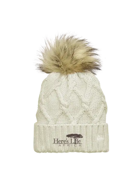New Era Ivory Faux Fur Pom Beanie w/Here's Life Africa Logo